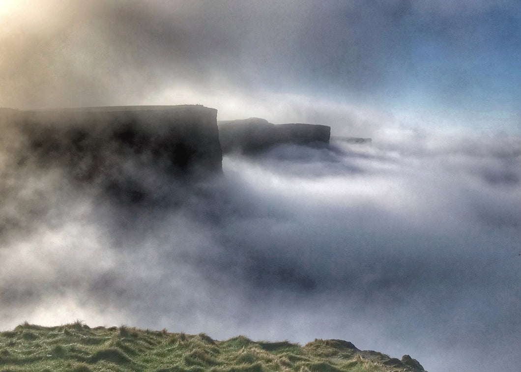 Cliffs of Moher on a cloudy day.